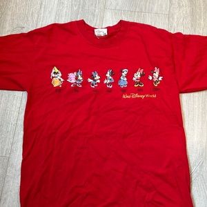 Vintage Minnie through the years disney world shirt.